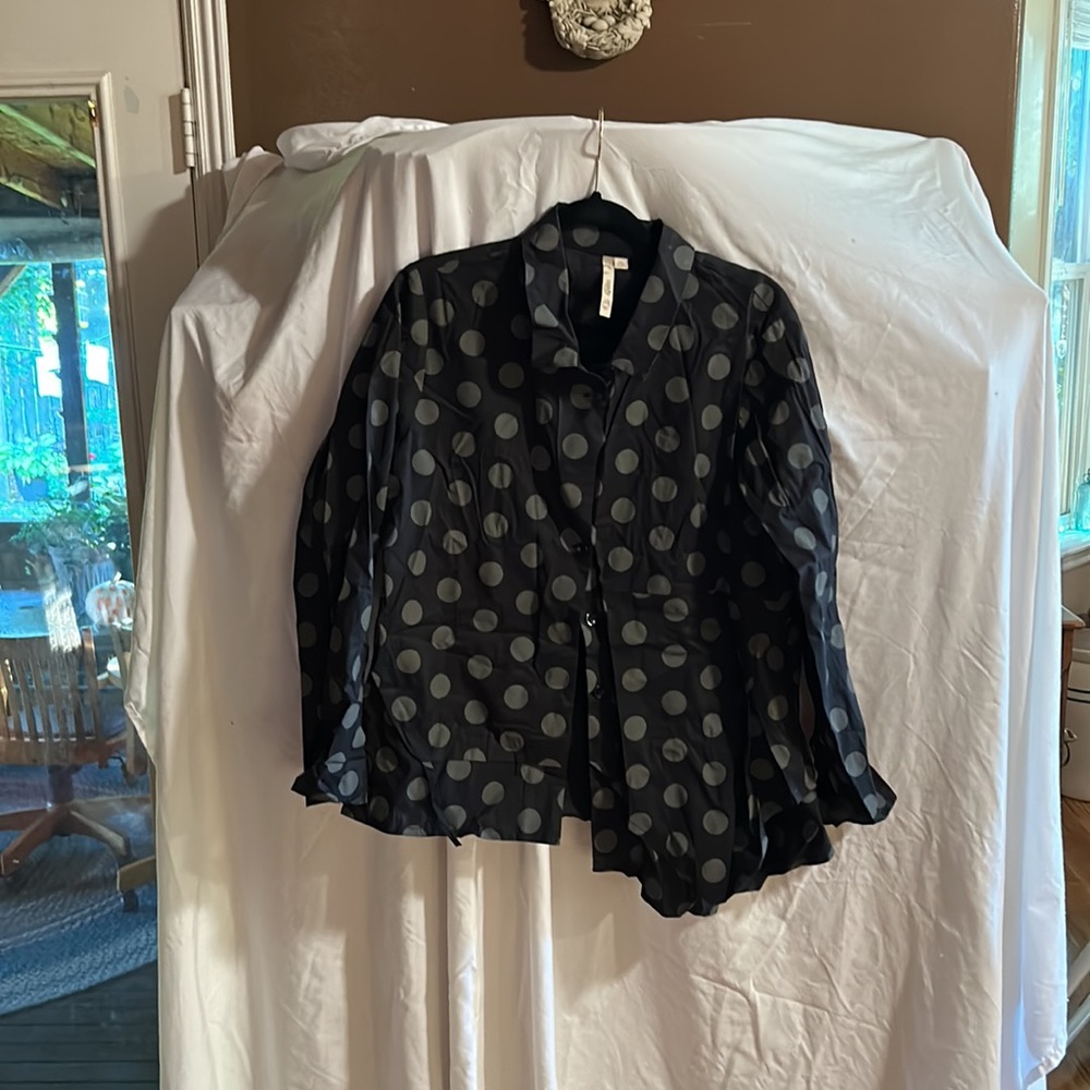 Black with gray polka dots a designer shirt similar to a tux